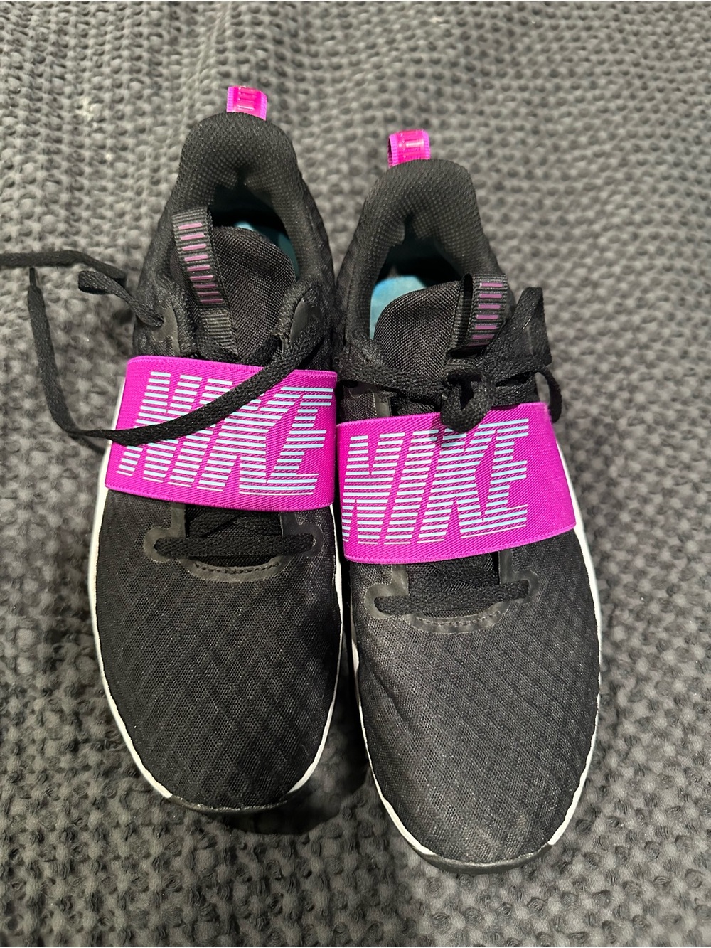 Nike women’s Black Sneakers with Bright Pink Strap
